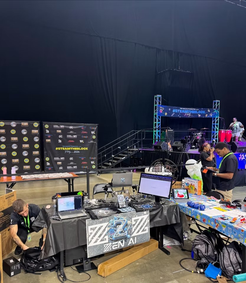 ZEN AI exhibition table set up inside the Steam the Block event venue